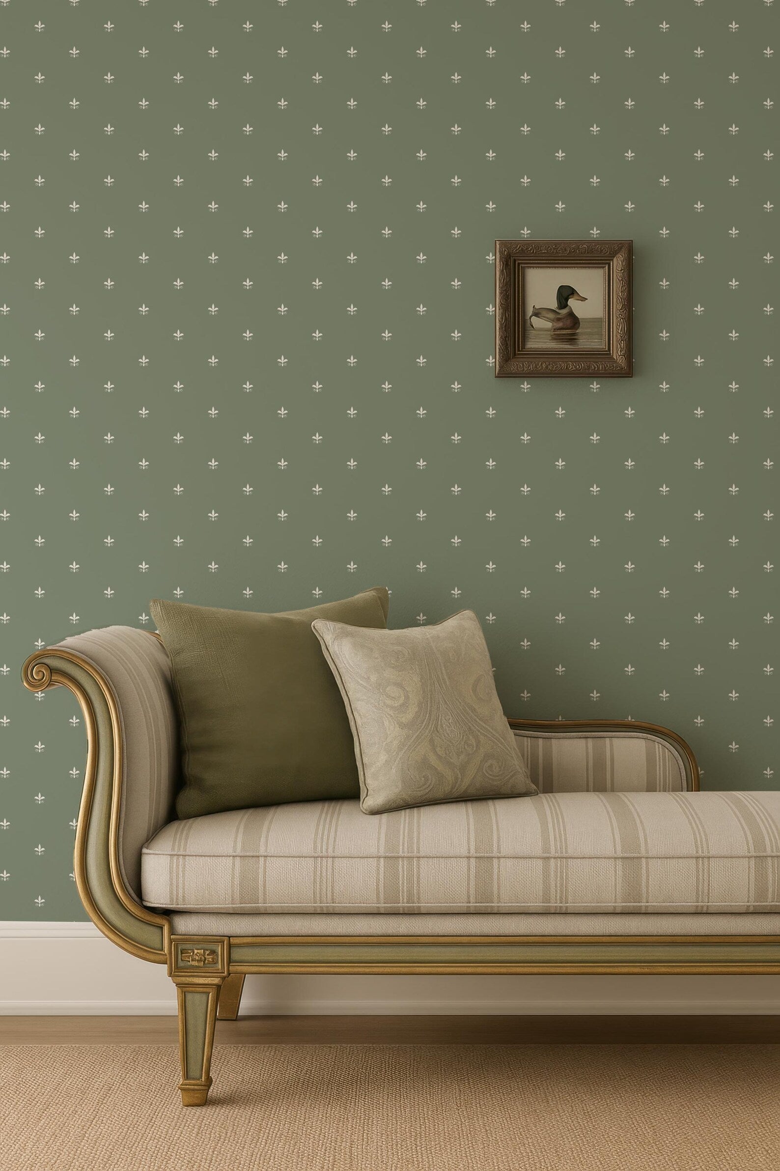 a cozy living room with a plush sofa adorned with two throw pillows, set against a wall with a green wallpaper pattern. A framed picture of a duck is hanging on the wall above the sofa, adding a touch of nature to the room's decor.