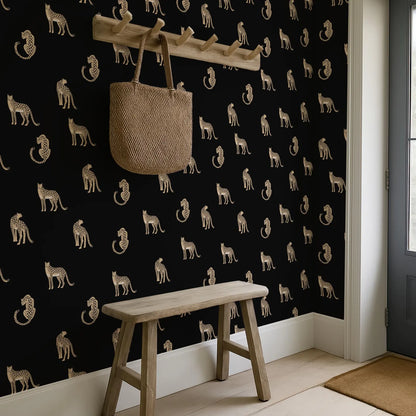 a black and white wall with a repeating pattern of leopard silhouettes, creating a striking visual effect. A wooden bench is positioned in front of the wall, and a woven bag is hanging on a wooden rack above it.