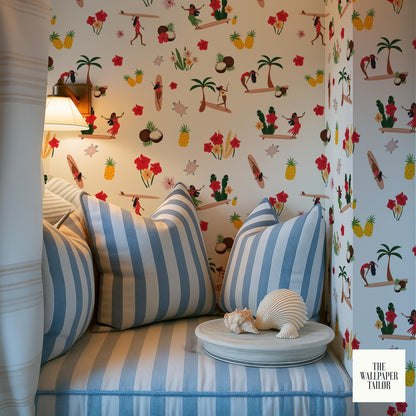 a cozy corner of a room with a striped cushion and a decorative shell on a small table. The wall behind the cushion is covered in a vibrant, tropical-themed wallpaper with various illustrations of people, palm trees, and other elements.