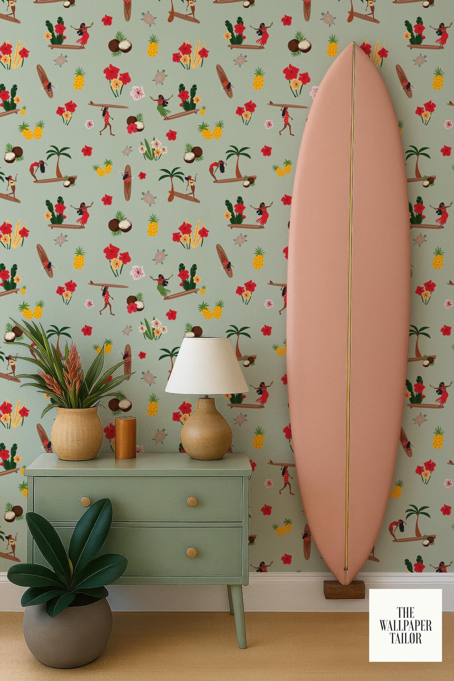 a vibrant and colorful wallpapered wall with a pink surfboard leaning against it. On a green dresser below the wall, there are two potted plants, a lamp, and a small table. The wallpapered wall has a repeating pattern of tropical fruits and palm trees, creating a lively and energetic atmosphere.