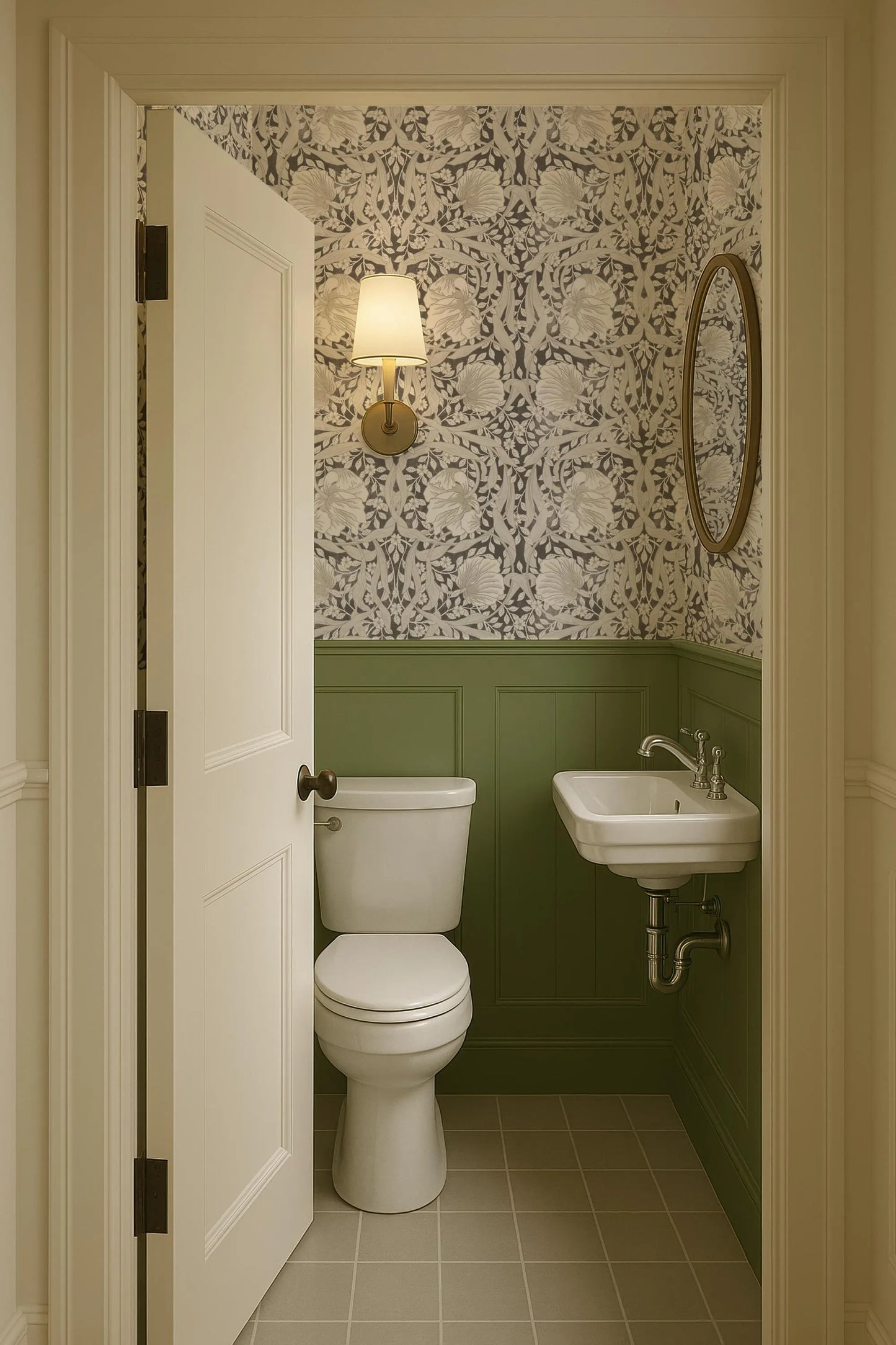a small bathroom with a white toilet and sink against a green wall with a patterned wallpaper. The door is open, revealing the interior of the bathroom.