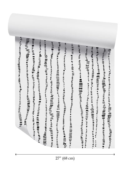 a roll of paper with a repeating pattern of vertical lines, which appears to be a minimalist design.