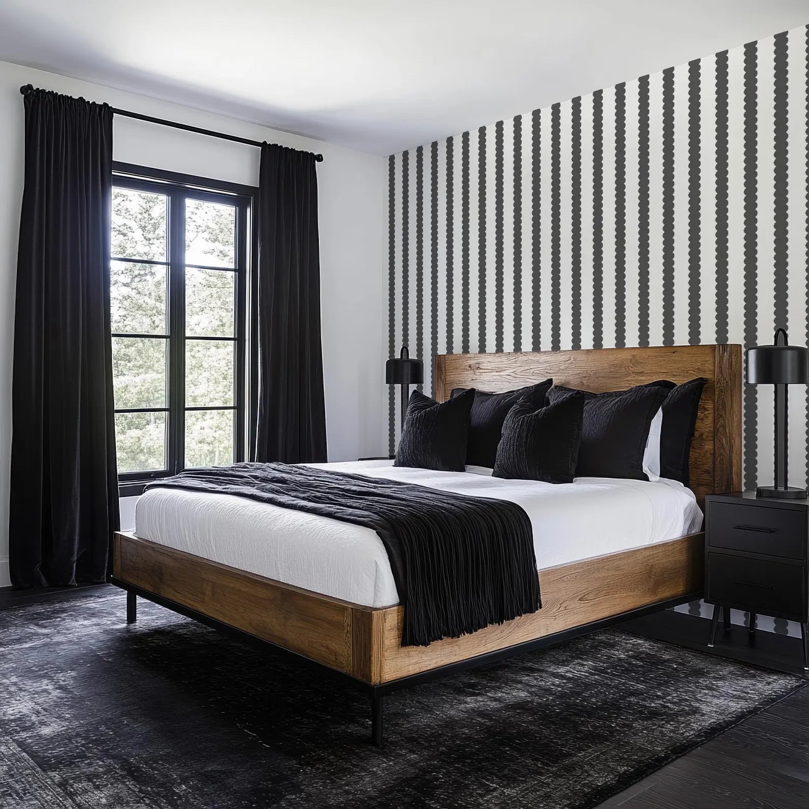 a modern bedroom with a large bed, wooden headboard, and black and white striped wallpaper. The bed is dressed in black bedding and has a wooden nightstand on each side. The room has a large window with black curtains, and the floor is covered in a gray rug.
