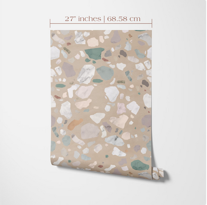 a pattern of small, irregularly shaped stones or pebbles in various shades of beige and gray, arranged in a repeating design.