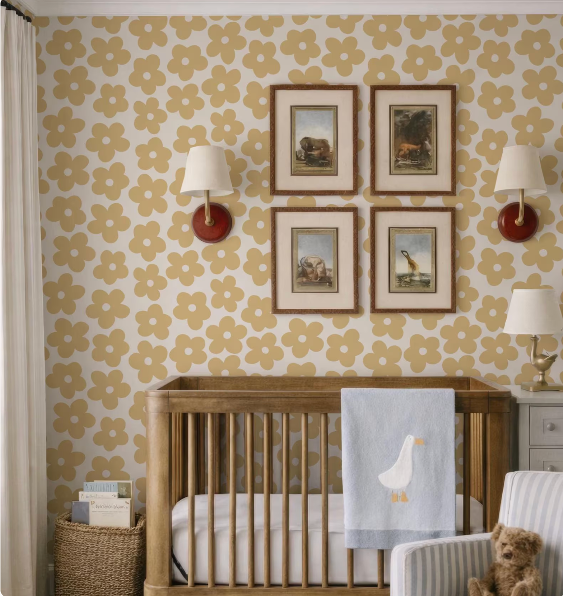 a cozy nursery with a wooden crib, a wall with framed pictures, and a beige and white floral wallpaper.