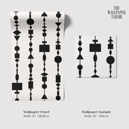 The image is a wallpaper panel and a wallpaper sample, both featuring a geometric pattern of black shapes and lines.