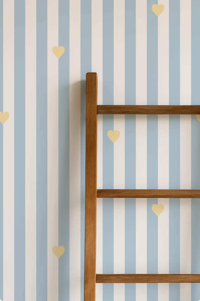 a wooden ladder leaning against a striped blue and white wall with small yellow heart-shaped decorations.