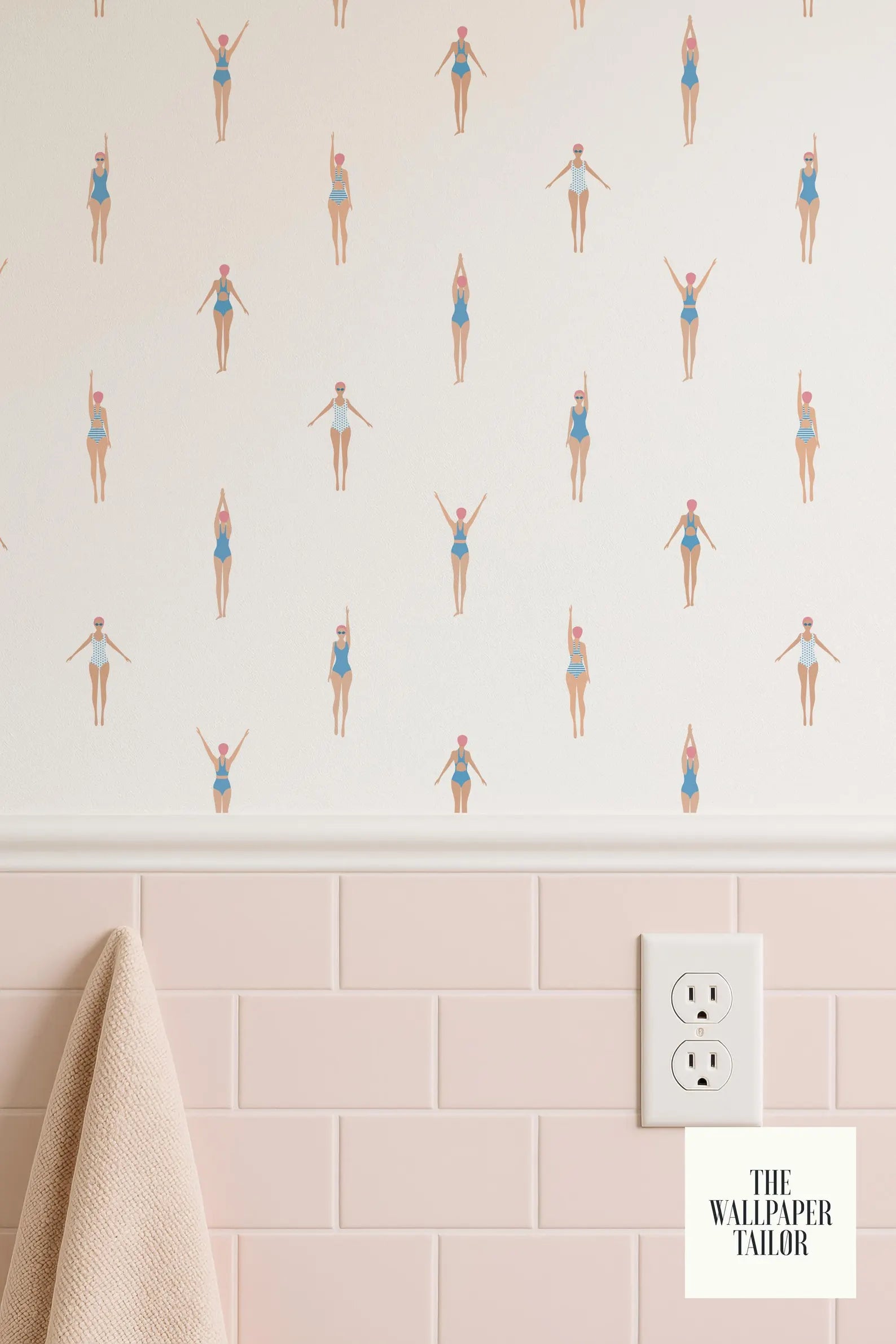 a wallpapered wall with a repeating pattern of swimming figures in various poses, including some with their arms raised. The wall is also adorned with pink tiles on the lower half, and there is a towel hanging on the left side.
