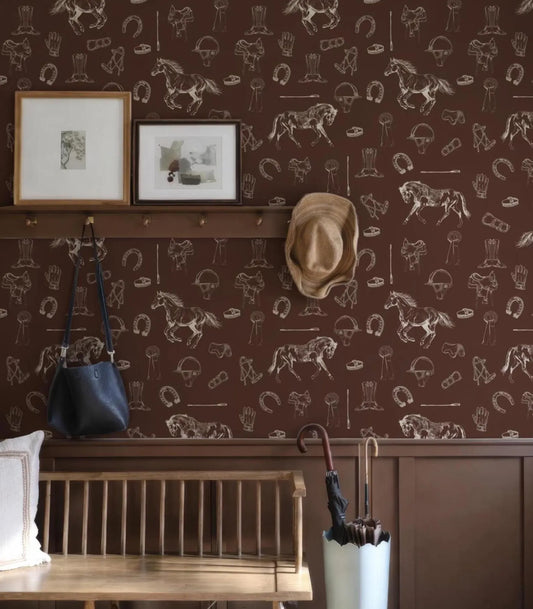 a room with a brown and white horse wallpaper, a wooden bench, a black purse, a hat rack, and a white umbrella.