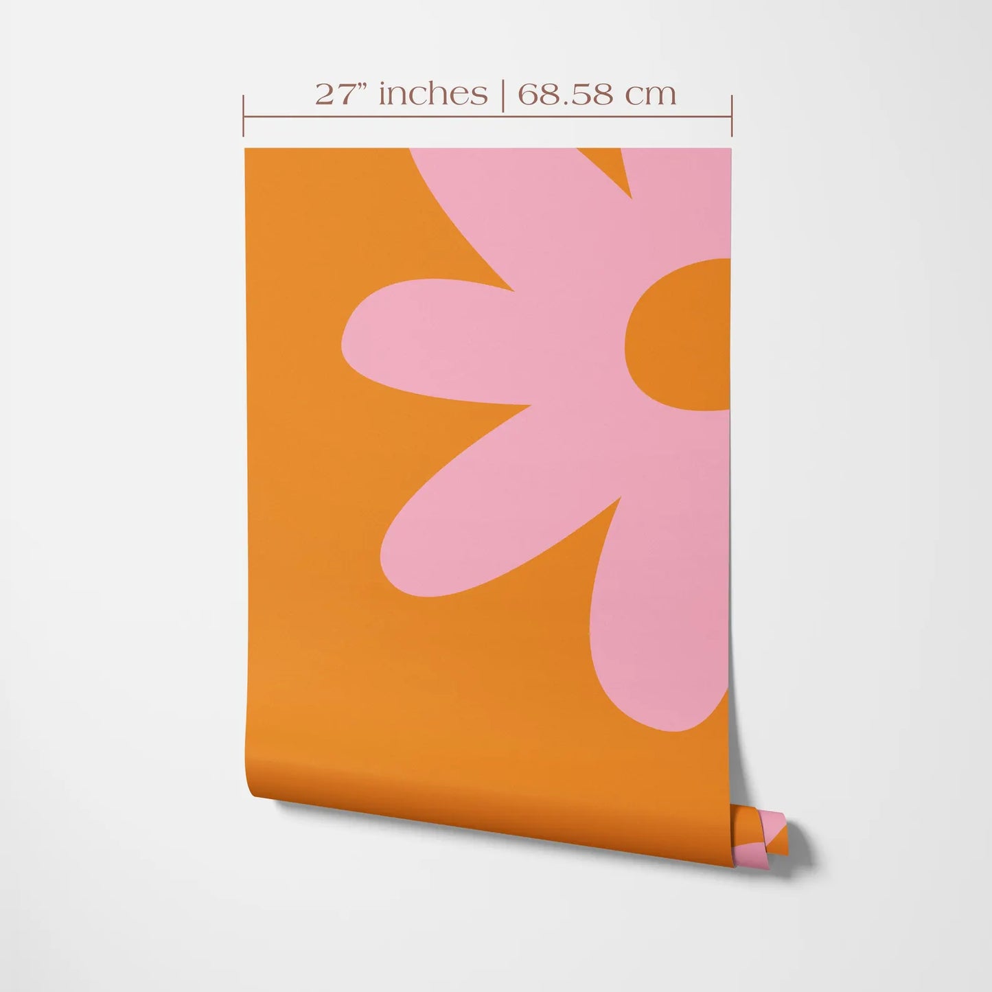 a large orange and pink flower design on a white background.