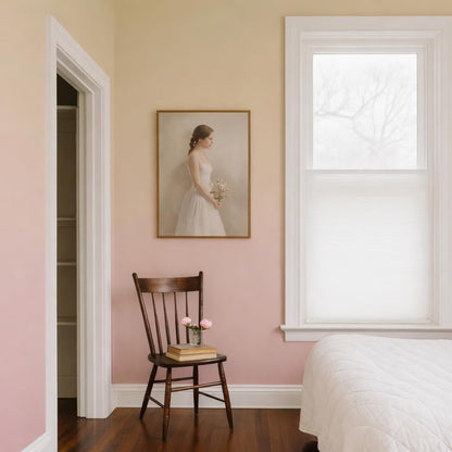 a bedroom with a wooden chair, a framed portrait of a woman, and a window with white blinds.