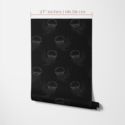 a repeating pattern of jellyfish silhouettes on a black background.