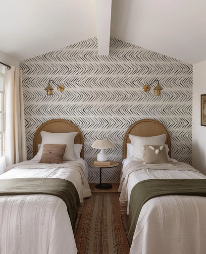 a couple of beds sitting next to each other in a bedroom