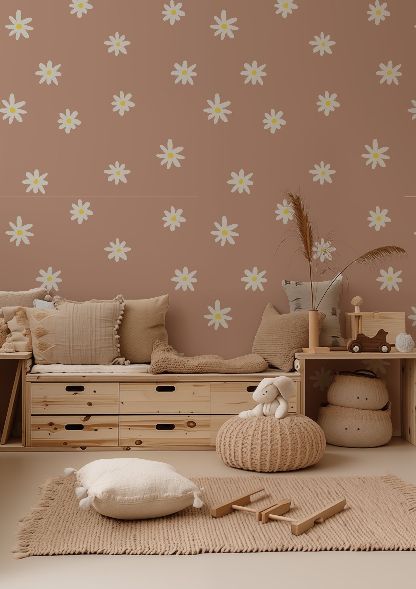 a living room with a couch, coffee table and flower wallpaper