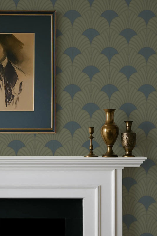 a white fireplace mantel with three decorative items on top, including a vase and a candlestick holder. Above the mantel, there is a framed artwork hanging on the wall.