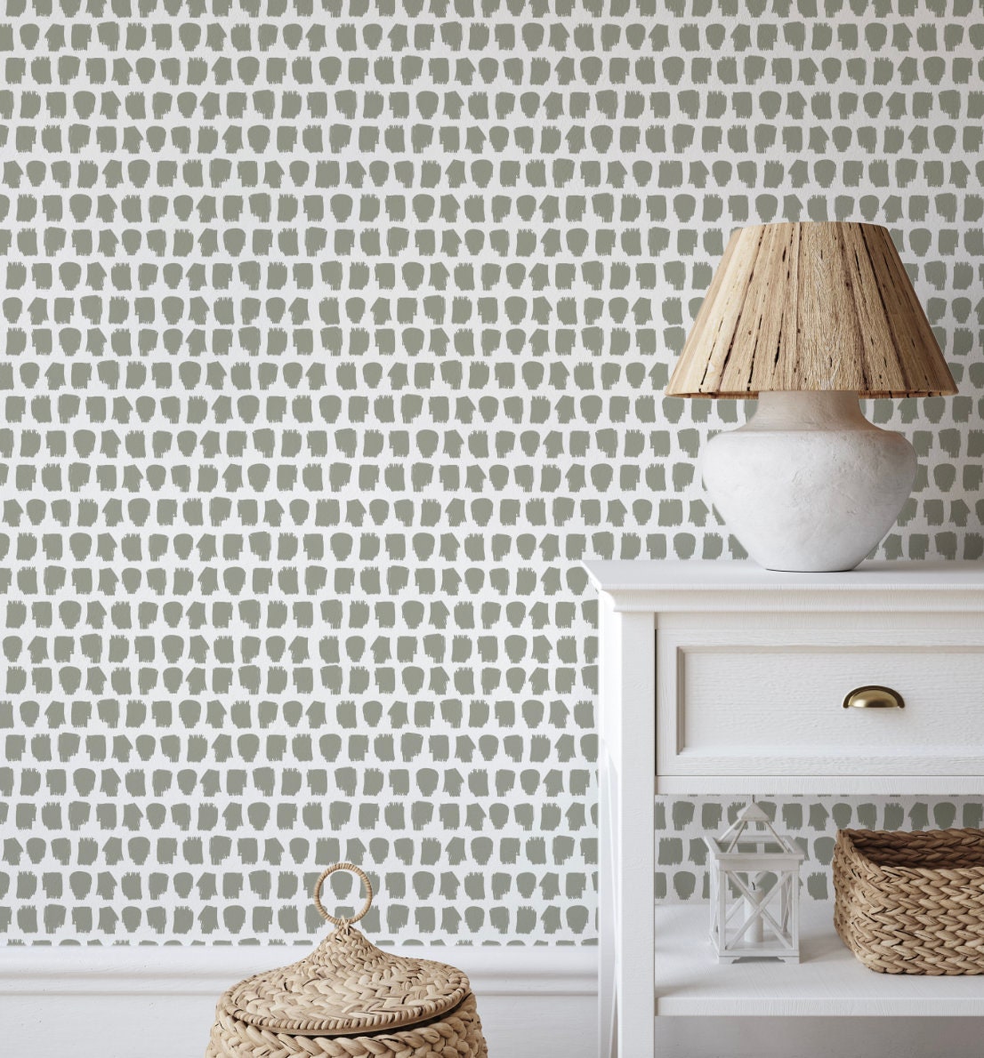 a chair and a table in front of a wall with a pattern on it