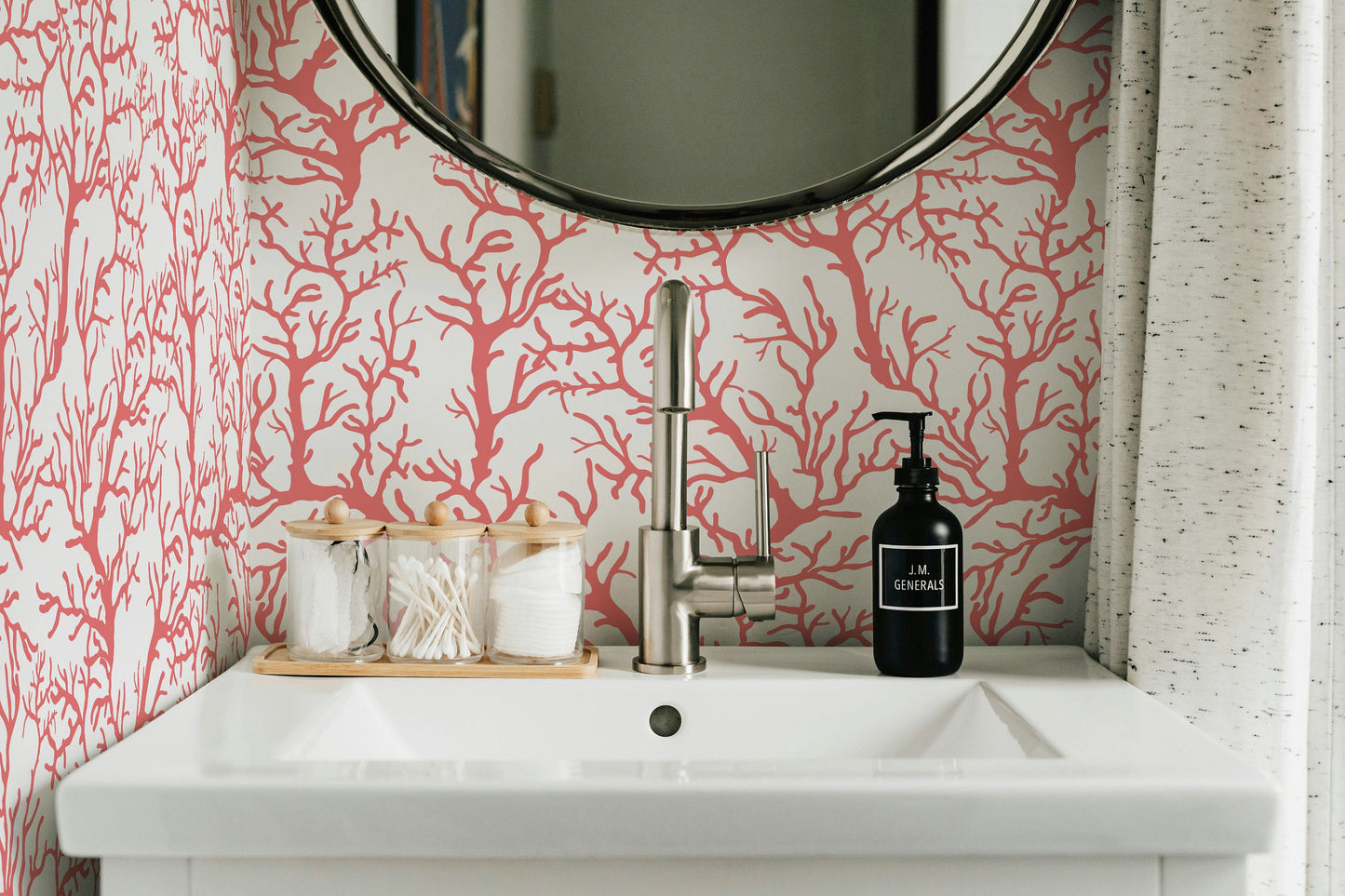 a bathroom sink with a mirror above it