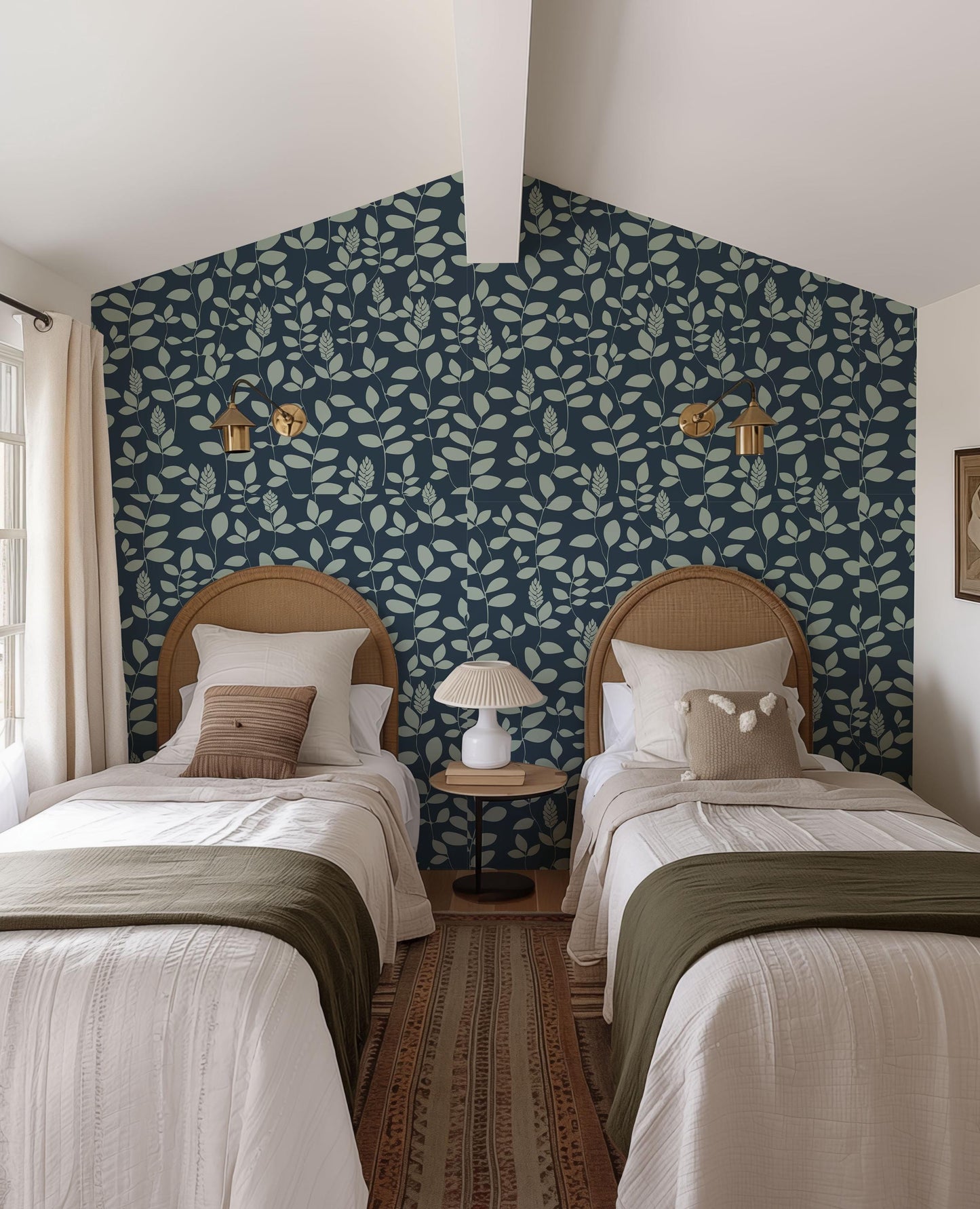 a couple of beds sitting next to each other in a bedroom