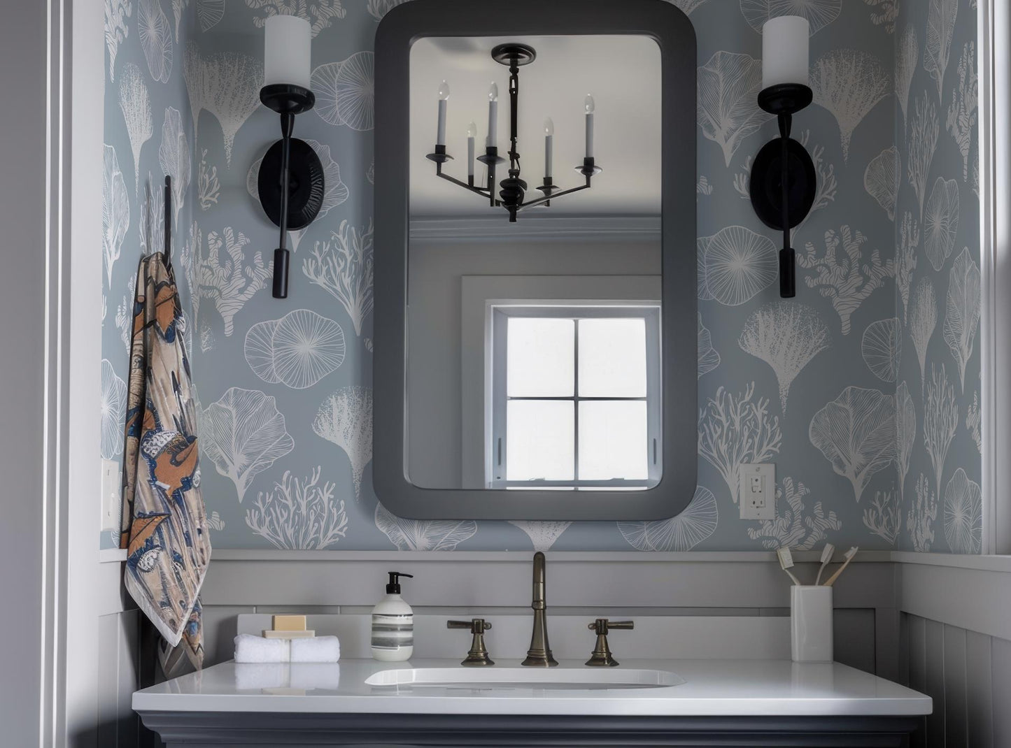 a bathroom sink with a large mirror above it