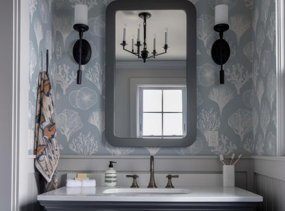 a bathroom sink with a large mirror above it