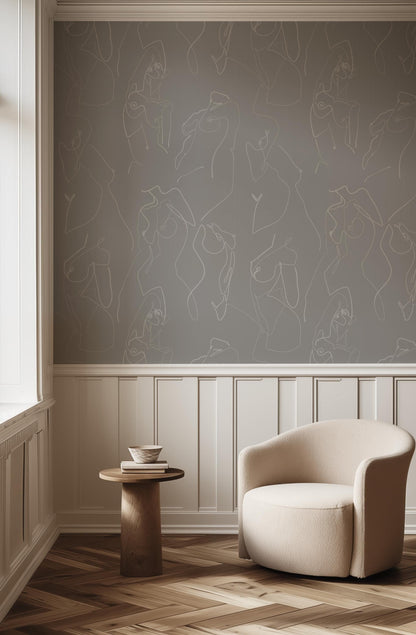 a gold lamp sitting on top of a white cabinet