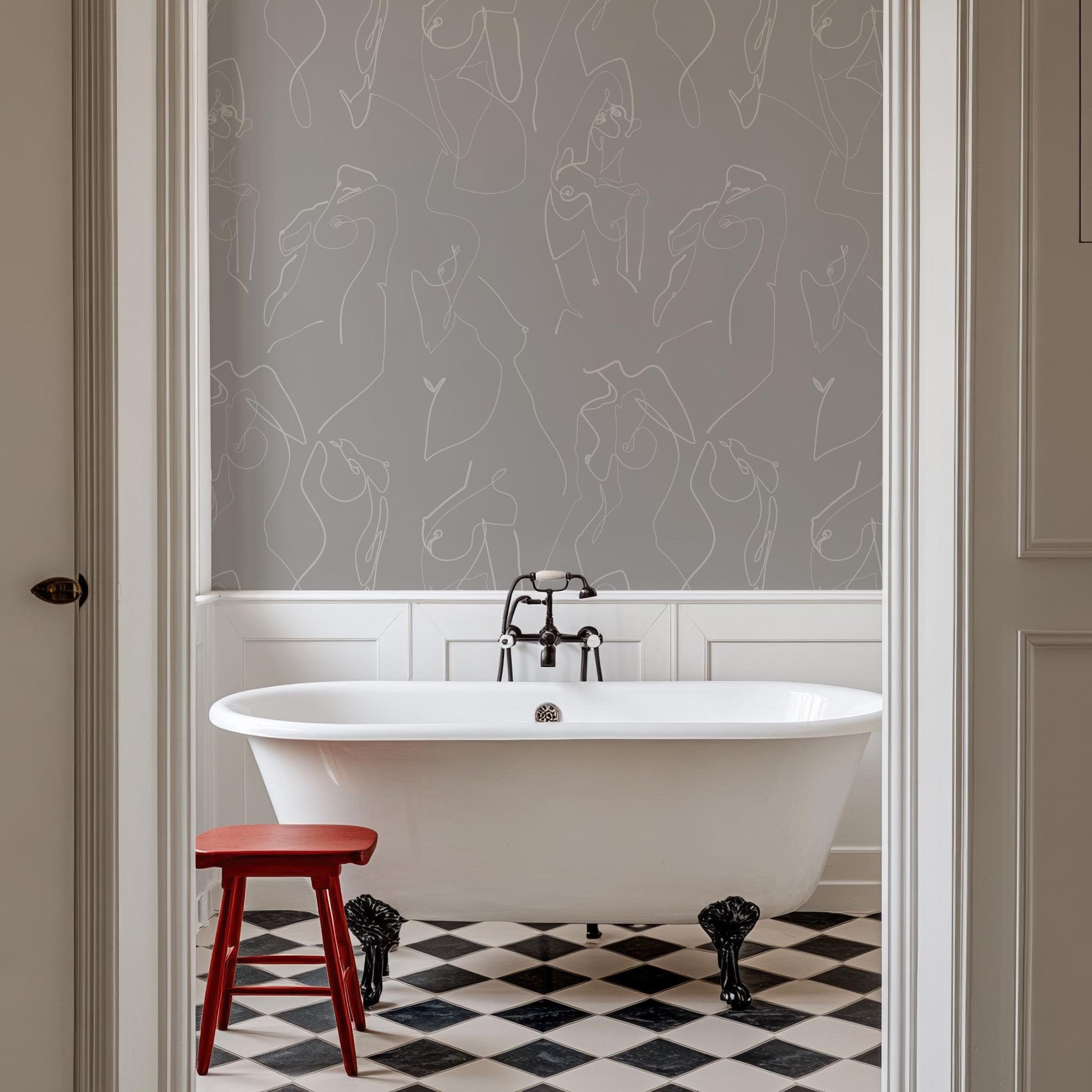 Wallpaper with female body line in a bathroom with a white tub