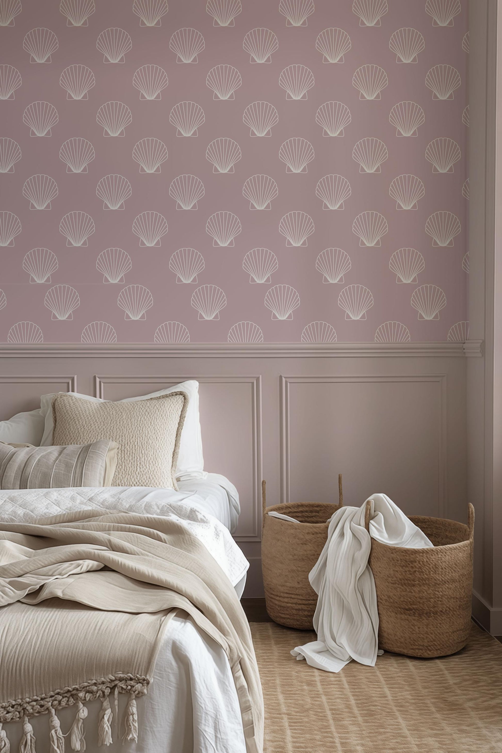 a bedroom with a pink wall and a white bed