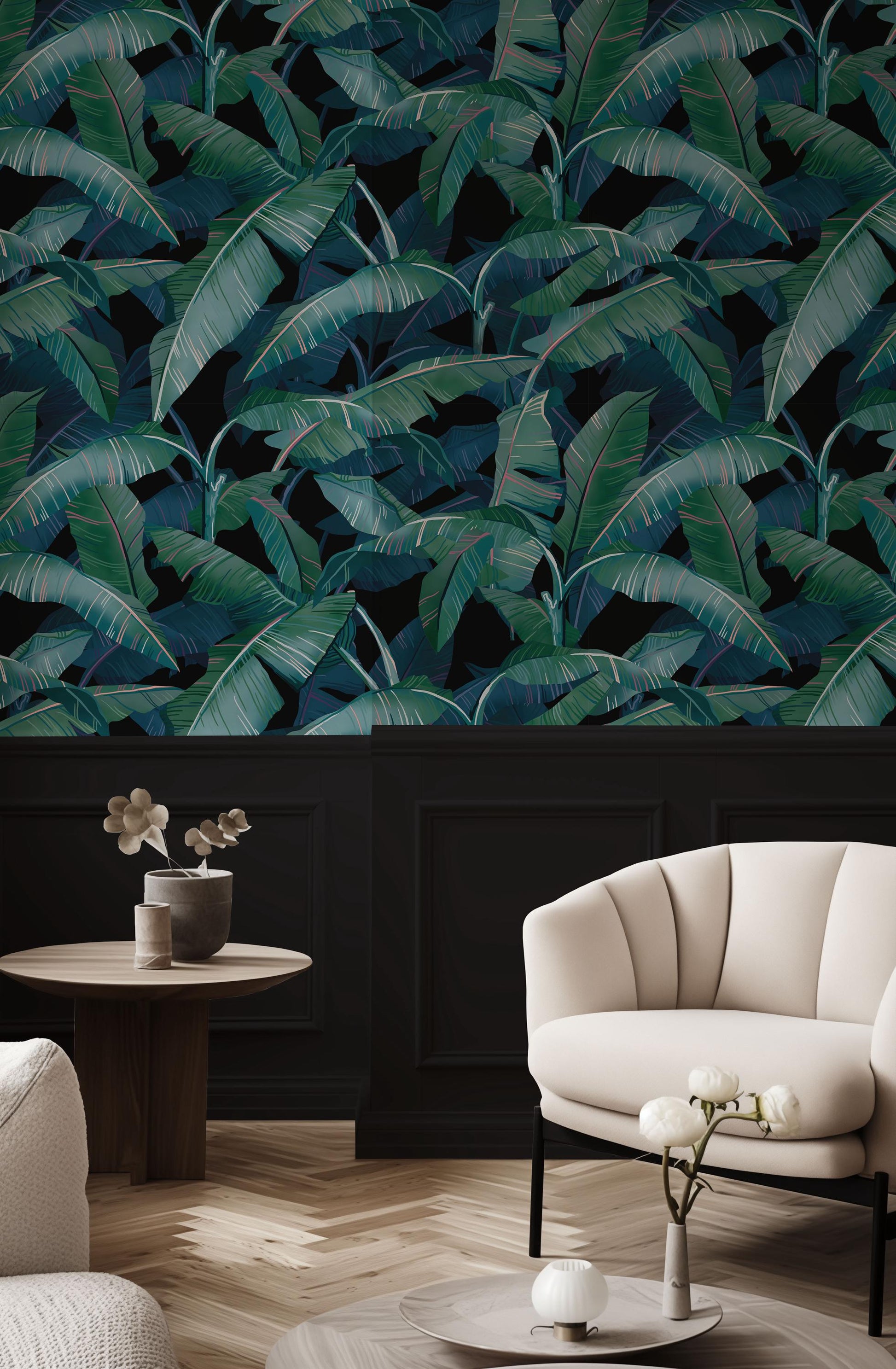 a man and a woman sitting on the floor in front of a wall with a