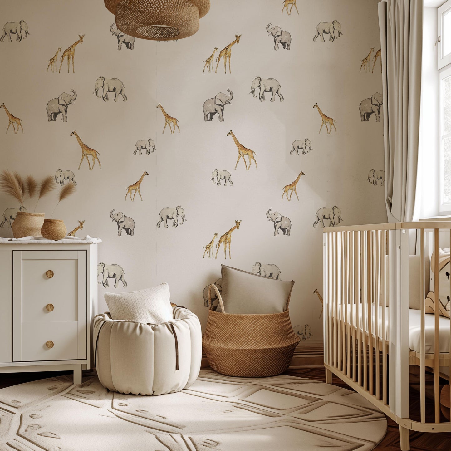 a baby's room with a giraffe wallpaper and a crib